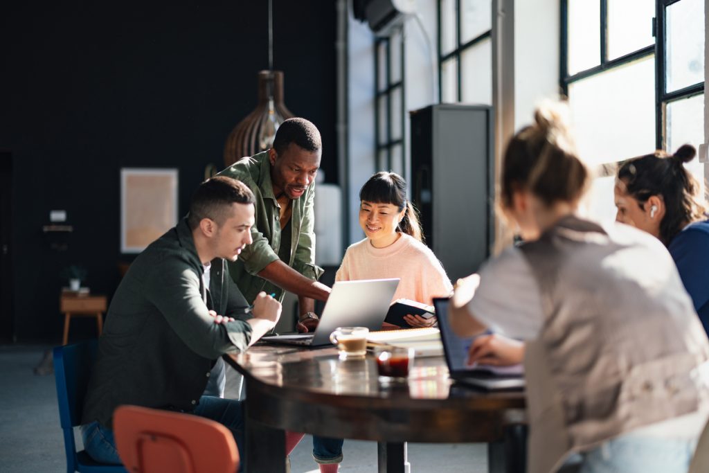 Work team sitting around a meeting table